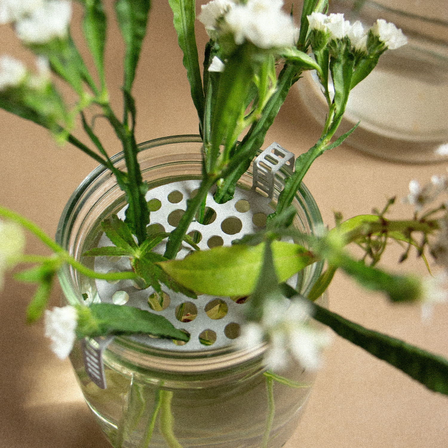 RE:KEBANA - recycled jar used as vase for picked flowers